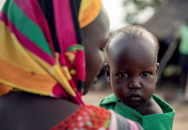 Anan holding her 3-year-old son Peter
