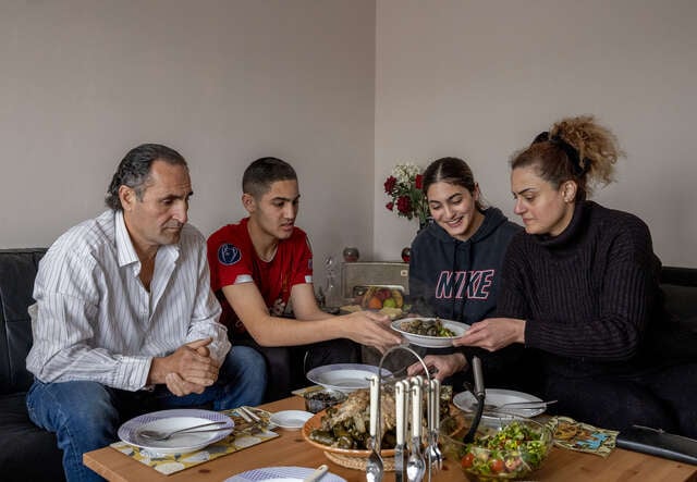 Chadia and her family having dinner.
