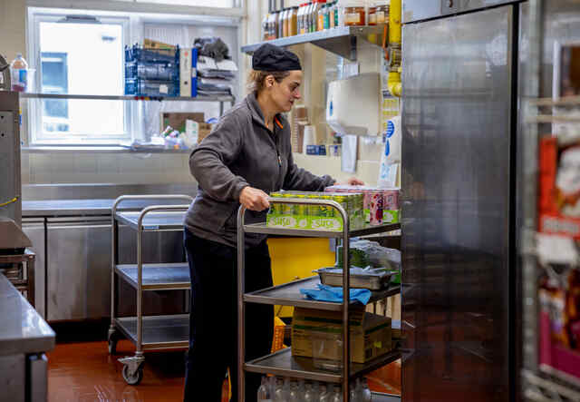 Chadia at work as a catering assistant at Vardean High School in Sussex