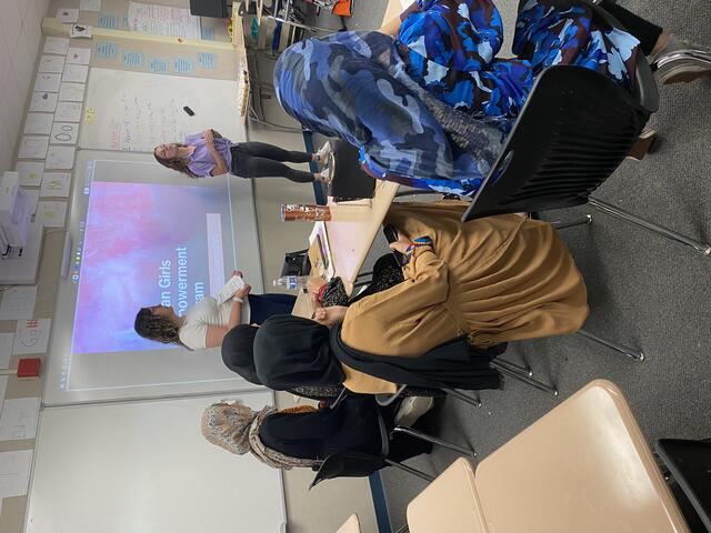 IRC Youth Mentors instruct a girls empowerment session for high school refugees