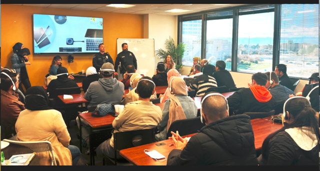 Officer Abdullah Syidi and Officer D. Fisher of the Aurora Police Department