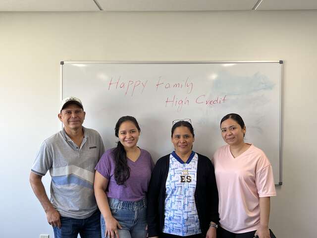 The Urbina family after completing the IRC financial literacy program 