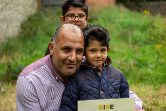 IRC RISE client Khaled with his two sons.