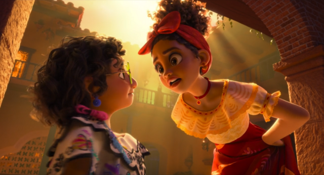 Dolores leans down to talk to Mirabel