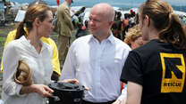 UNHCR Special Envoy Angelina Jolie and United Kingdom Foreign Secretary William Hague visit Nzolo camp, near Goma, March 2013.