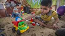 A Syrian boy plays at an IRC class for children with special needs at the Karameh camp, Syria.