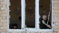 A view of a broken window at School in Ukraine after a shelling attack.