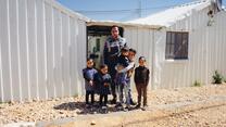 Mohammad with his family in Jordan
