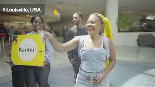 A keyboard of a laptop gives way to humanitarian aid being delivered to people in crisis.