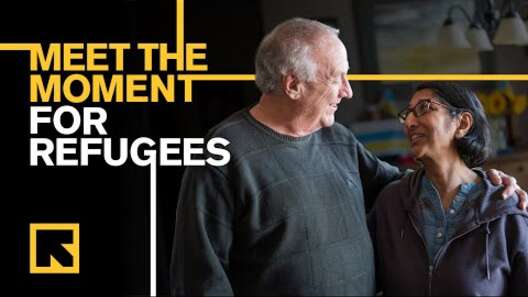 Wizie and a young boy whose family recently resettled in the US