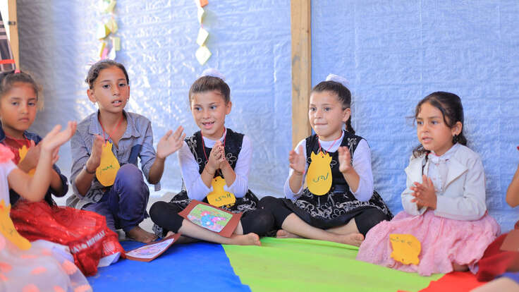 Displaced children take part in an activity organized by the IRC and Save Youth Future Society.