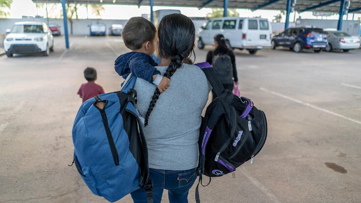 Central American mother with her child after being released from detention