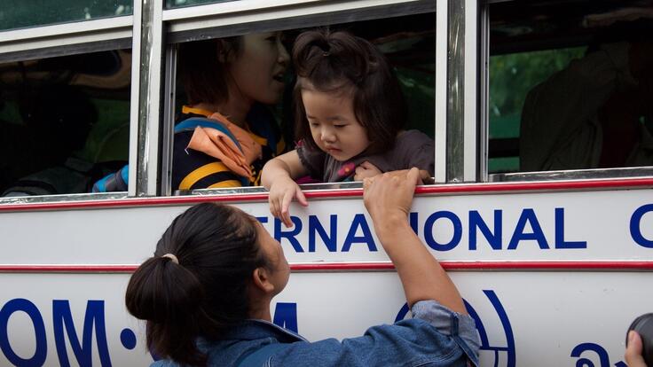 Burmese refugees saying goodbye to loved ones for the last time.